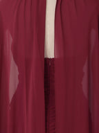 Burgundy ruched halter cape maxi dress, back skirt detail.