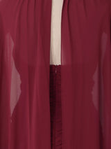 Burgundy ruched halter cape maxi dress, back skirt detail.
