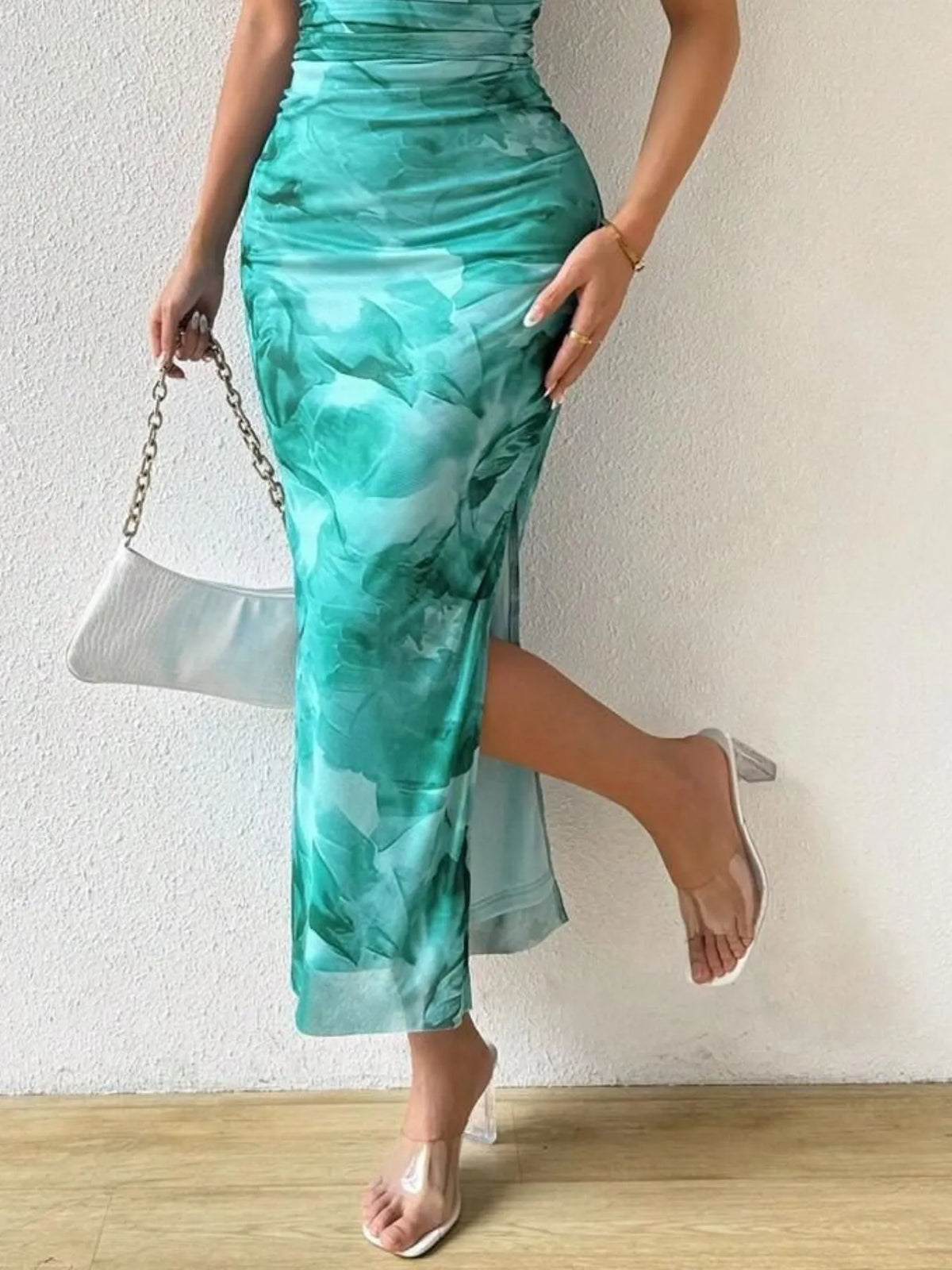 Turquoise printed strapless side-slit maxi dress, skirt detail.