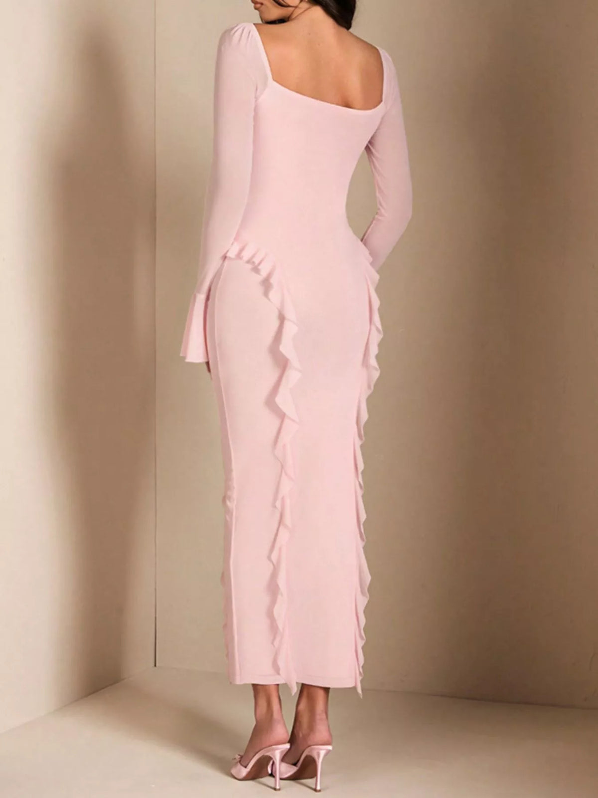 Pink floral ruffle maxi dress, back view.