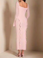 Pink floral ruffle maxi dress, back view.