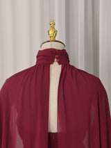 Burgundy ruched halter cape maxi dress, back neckline detail.