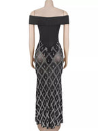 Black rhinestone sheer off-shoulder maxi dress, back view.