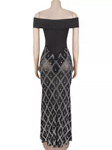 Black rhinestone sheer off-shoulder maxi dress, back view.