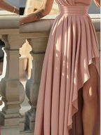 Blush pink one-shoulder high-low slit maxi dress, skirt detail.