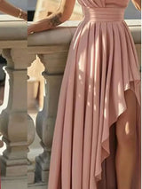 Blush pink one-shoulder high-low slit maxi dress, skirt detail.