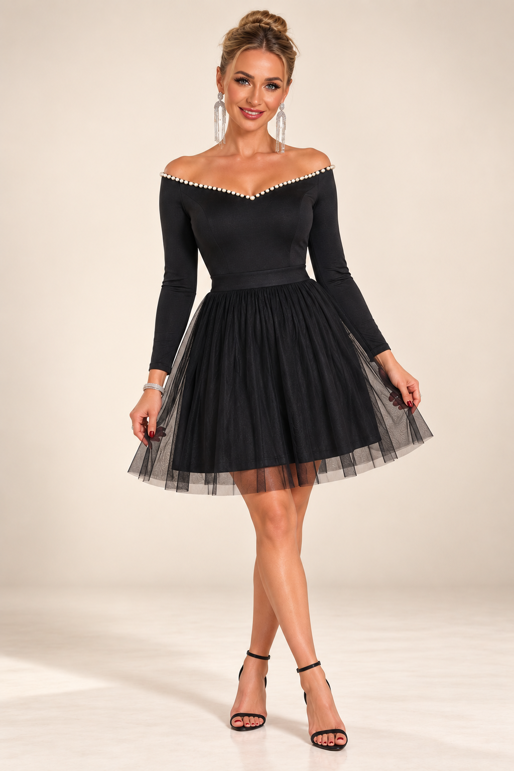 Black pearl-trim off-shoulder mini dress, front view.
