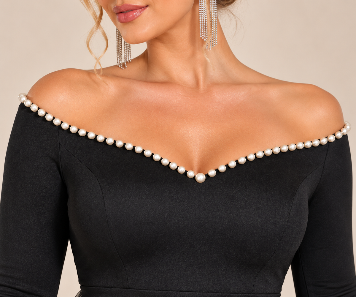 Black pearl-trim off-shoulder mini dress, neckline detail.