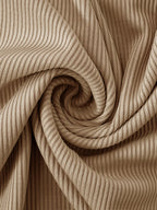 Beige ribbed dress fabric close-up