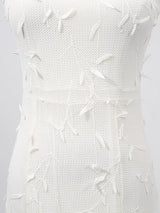 White sleeveless floral appliqué midi dress, fabric close-up.
