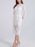 White lace long-sleeve midi dress, front view.
