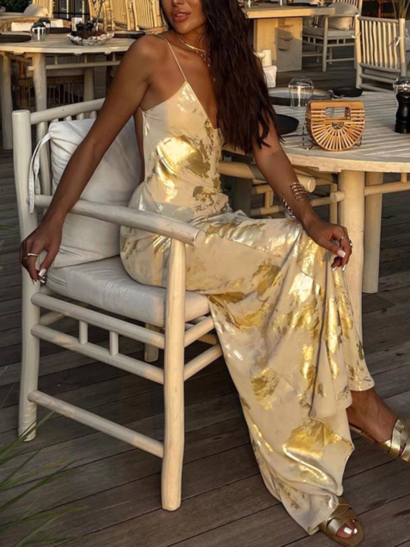Gold backless maxi dress fabric detail