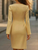 Yellow long-sleeve buttoned blazer mini dress, back view.