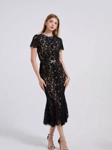 Black short-sleeve lace mermaid midi dress, front view.