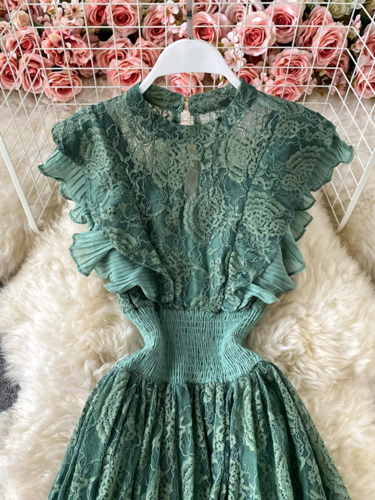 Dark green ruffled mock-neck lace maxi dress, bodice detail.
