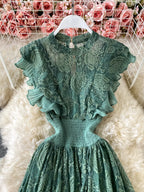 Dark green ruffled mock-neck lace maxi dress, bodice detail.