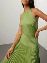 Pleated halter-neck maxi dress flowing silhouette