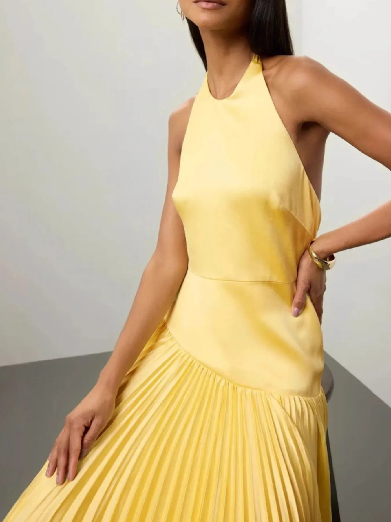 Pleated maxi dress tied halter neckline detail