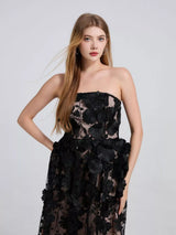 Black floral appliqué strapless midi dress, front view.