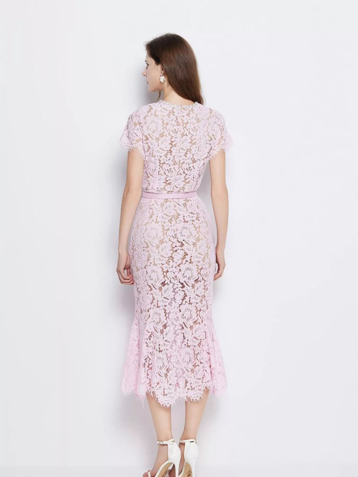 Pink short-sleeve lace mermaid midi dress, back view.