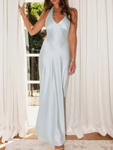 Light blue halter neck wrap maxi dress with tie detail, front view.