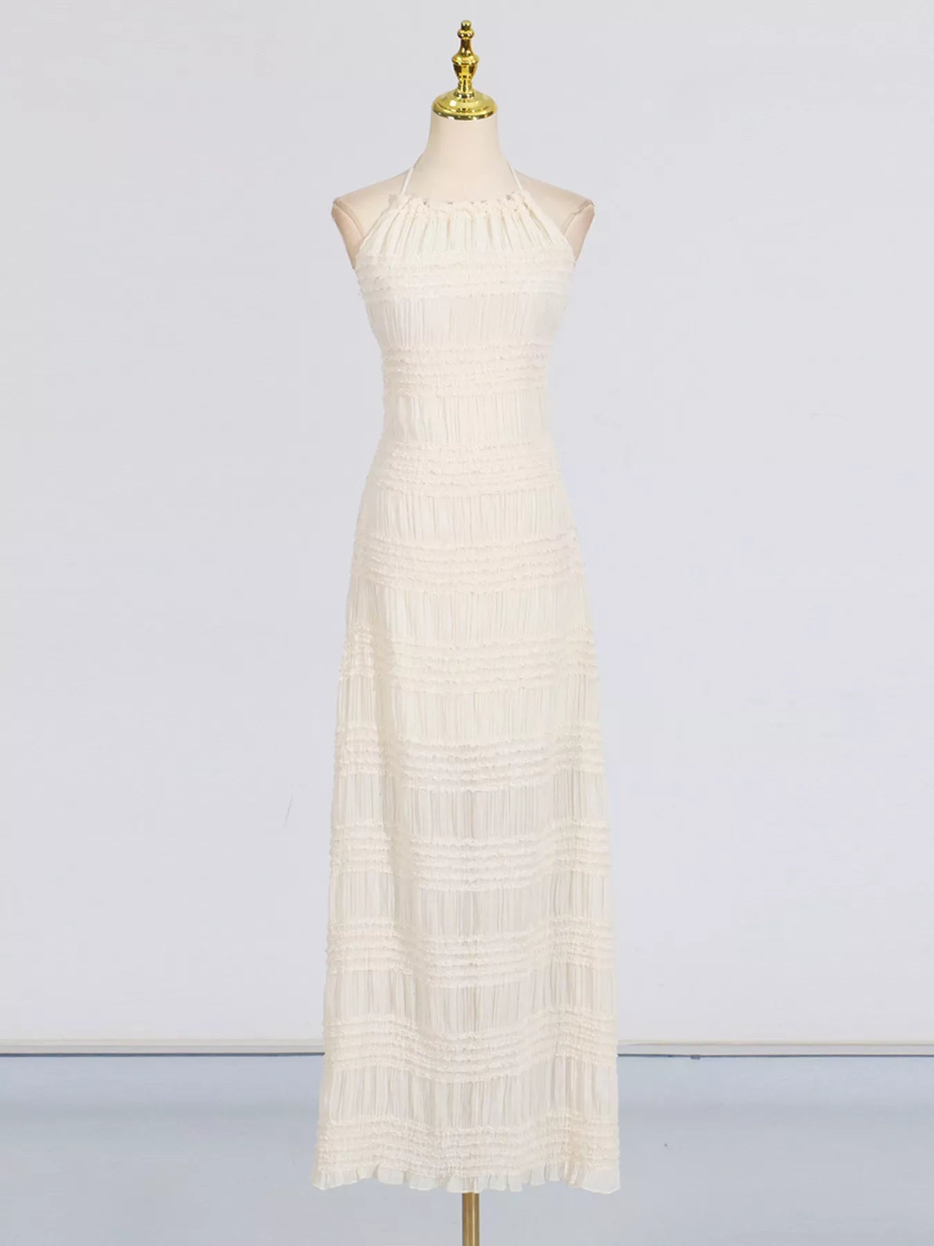 Smocked ruched maxi dress detail