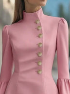 Pink ruffled bell-sleeve mini dress, neckline detail.