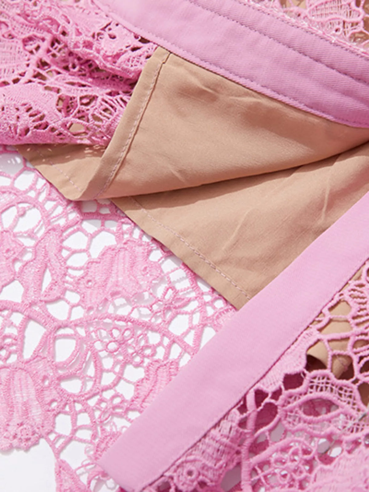 Pink lace button-up midi dress with pockets, lining detail.