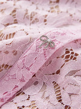 Pink short-sleeve lace mermaid midi dress, lace detail.