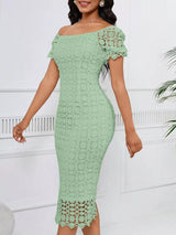Sage green short-sleeve lace midi dress with slit, front view.