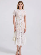 Ivory short-sleeve lace mermaid midi dress, front view.