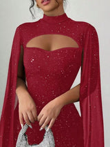 Red glitter cutout bodycon mini dress with cape sleeves, neckline detail.