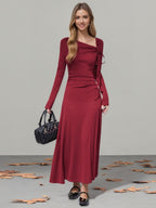 Red asymmetrical neckline long sleeve dress
