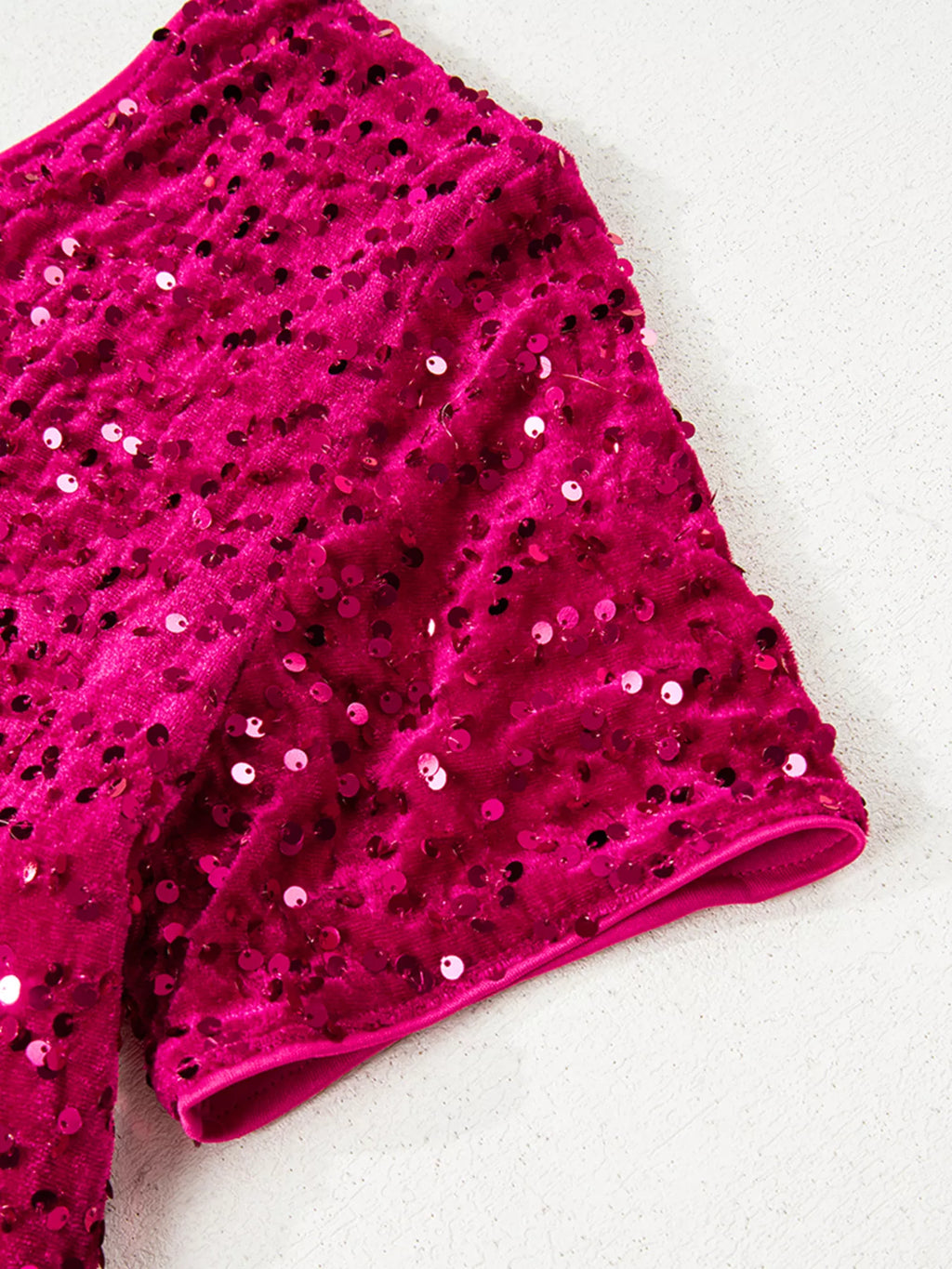One-shoulder sequin dress detail