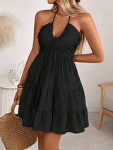 Black smocked halter tiered mini dress, front view
