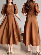 Tan belted midi dress side view