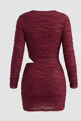 Burgundy ruched cowl-neck mini dress, back view.