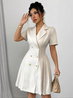 Ivory double-breasted pleated blazer mini dress, front view.