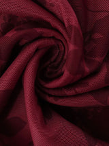 Burgundy floral mesh dress fabric close-up