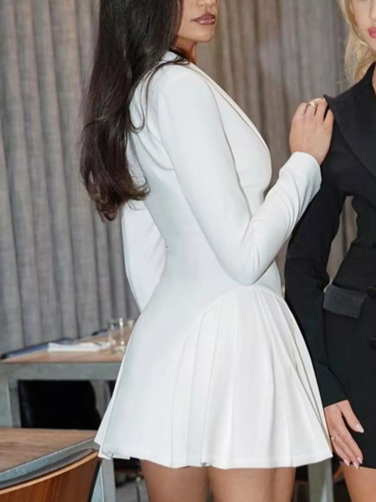 White button-down blazer pleated mini dress, side view.