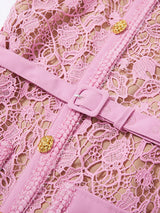 Pink lace button-up midi dress with pockets, waist detail.