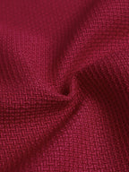 Red pearl-trim v-neck bodycon dress, waist detail.