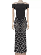 Black rhinestone sheer off-shoulder maxi dress, front view.