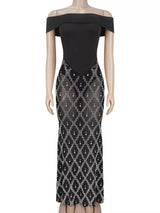 Black rhinestone sheer off-shoulder maxi dress, front view.