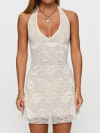 Ivory floral lace halter bodycon mini dress, front view.