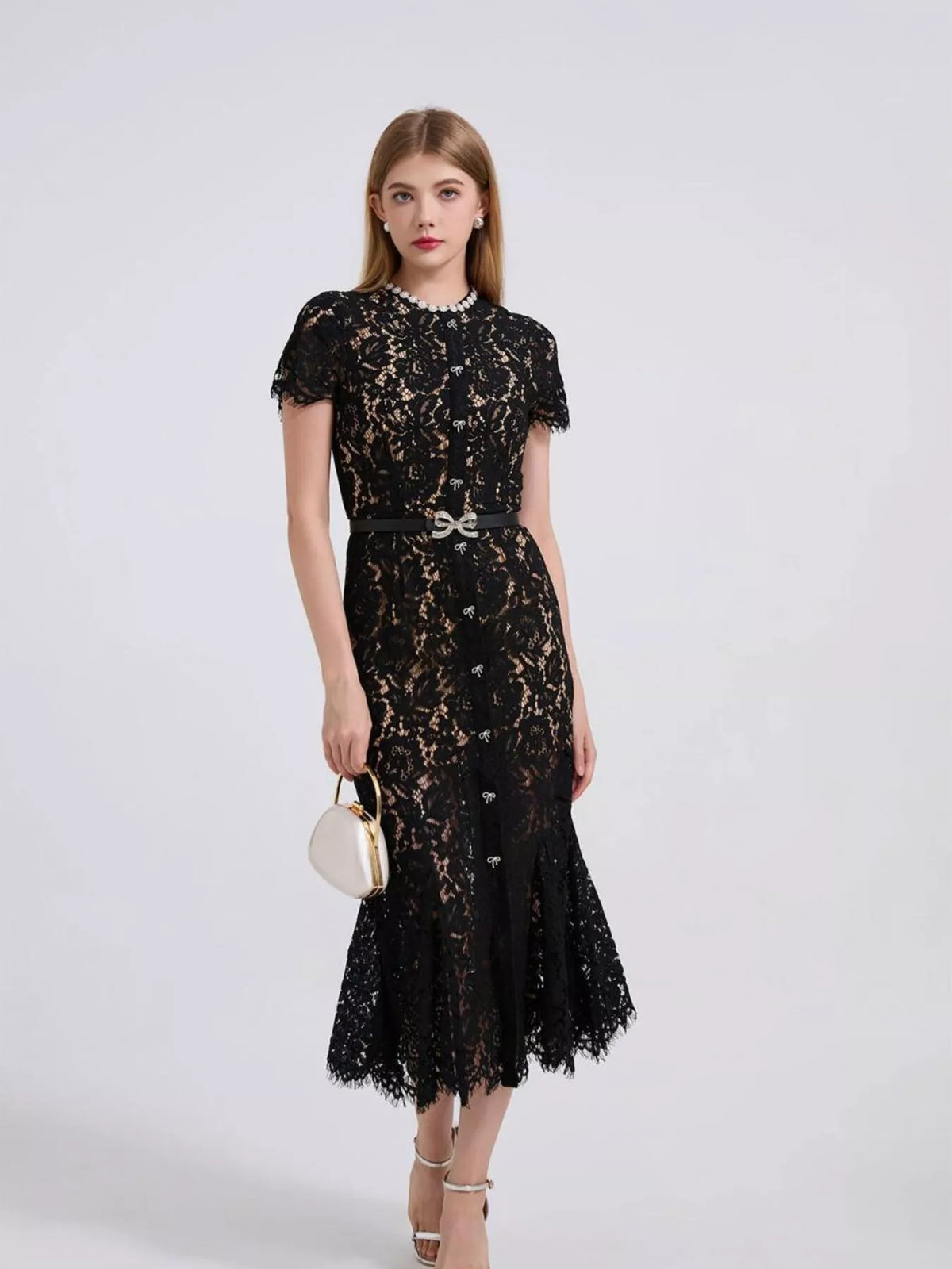 Black short-sleeve lace mermaid midi dress, front view.