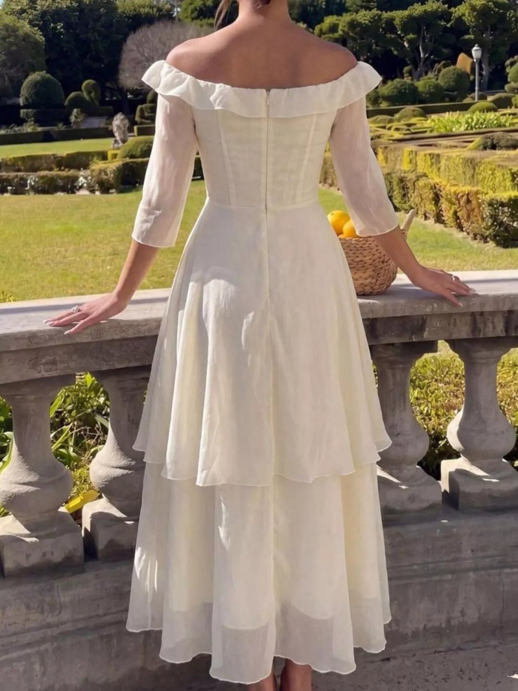 Cream off-shoulder layered midi dress detail view