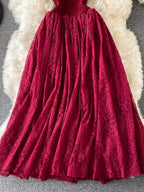 Burgundy ruffled mock-neck lace maxi dress, skirt detail.