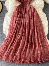Rust ruffled mock-neck lace maxi dress, skirt detail.