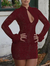 Burgundy lace cutout long-sleeve mini dress, front view.